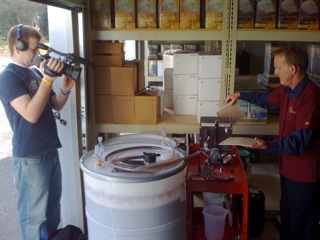 andy filtering wine with videographer sm.jpg